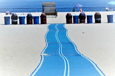 Row of chairs on beach