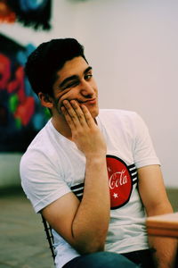 Young man sitting outdoors