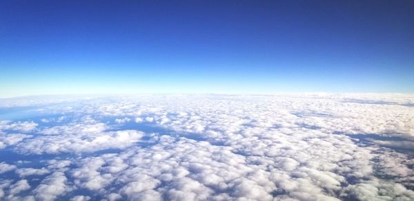 Aerial view of cloudscape against blue sky