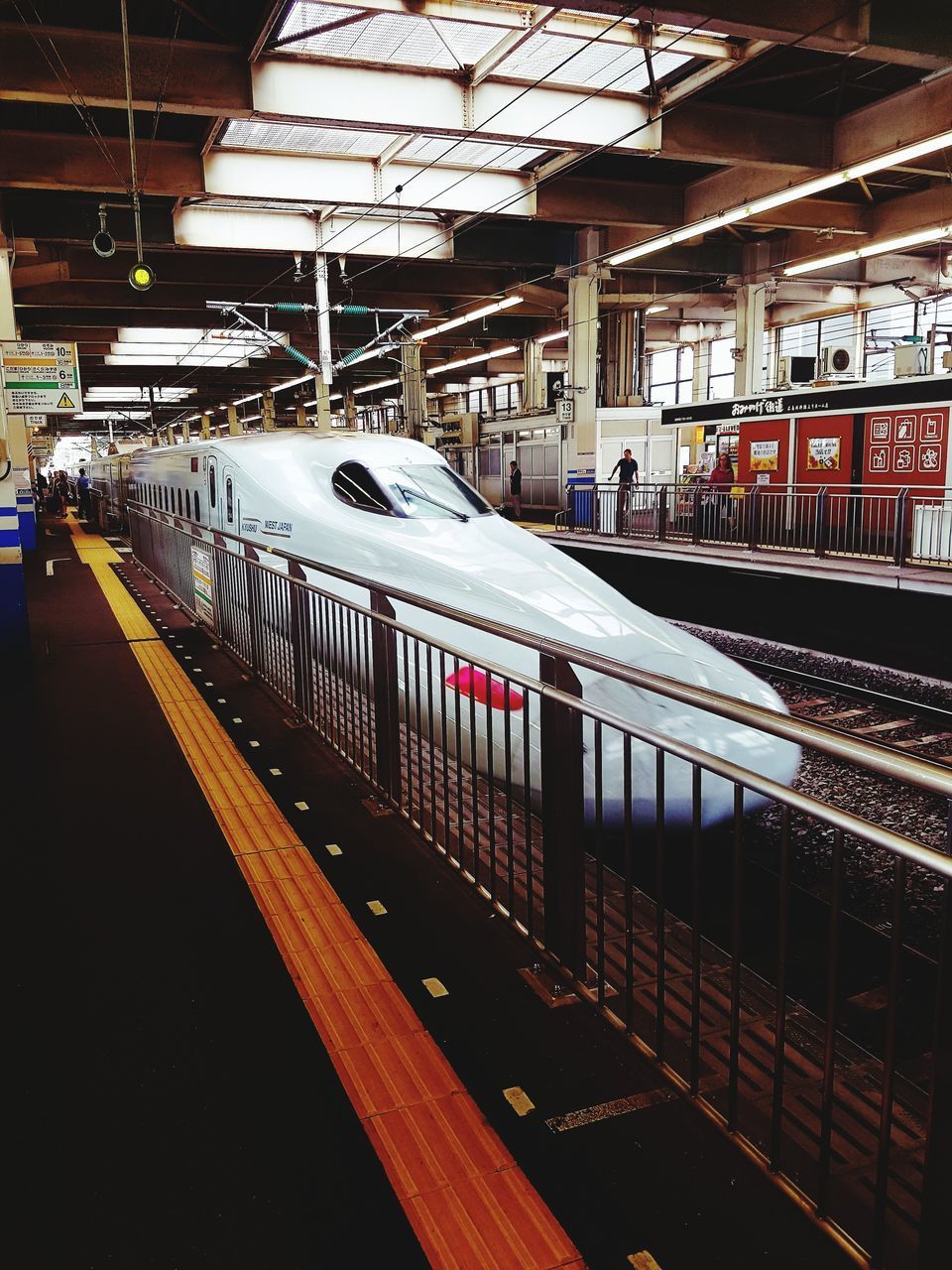 TRAIN ON RAILROAD STATION