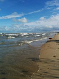 Scenic view of beach against sky