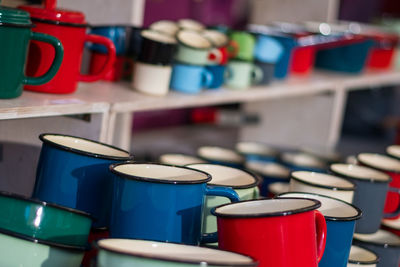 Close-up of multi colored cups 