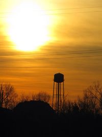 Silhouette of trees against sky during sunset