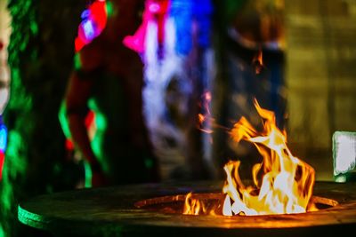 Close-up of illuminated fire pit at night