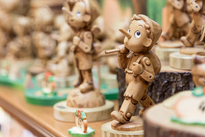 Close-up of figurines on table