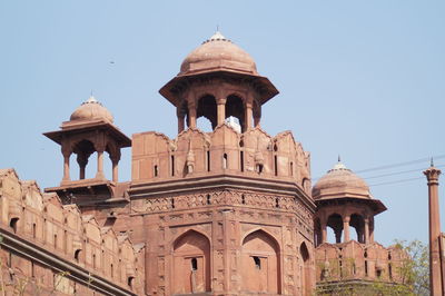 Low angle view of cathedral against clear blue sky