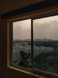 Buildings seen through window