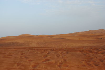 Scenic view of desert against sky