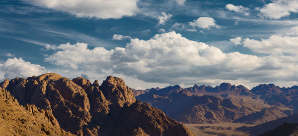 Panoramic view of mountain range against sky