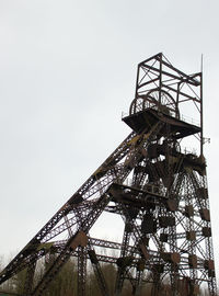 Low angle view of metal structure against sky