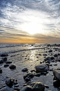 Scenic view of sea against sky during sunset