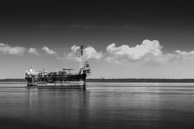 Ship on sea against sky