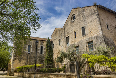 Low angle view of old building against sky