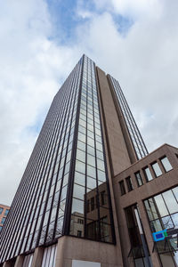 Low angle view of skyscraper against sky