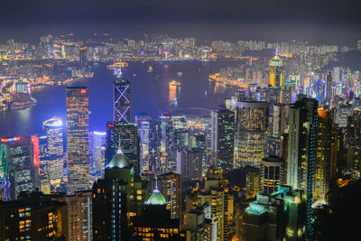 Aerial view of city lit up at night