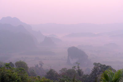 Scenic view of mountains against sky during sunset