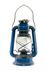 Close-up of electric lamp against white background