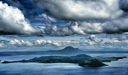 Scenic view of sea against cloudy sky