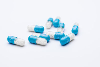 Close-up of blue buttons against white background