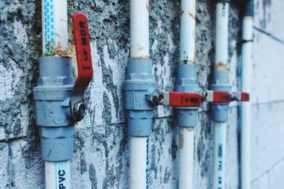 Close-up of pipes on wall