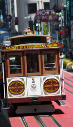 Close-up of vintage car on city street