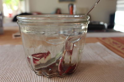 Close-up of drink in glass jar on table