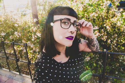 Portrait of hipster woman in eyeglasses