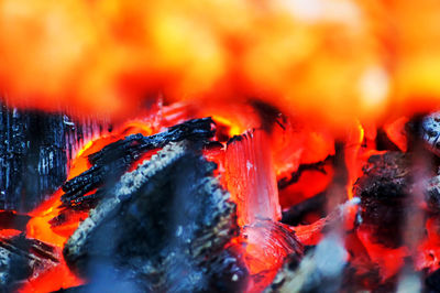 Firewood burning on barbecue grill