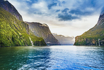 Scenic view of sea against cloudy sky