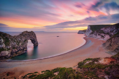 Scenic view of sea against sky during sunset