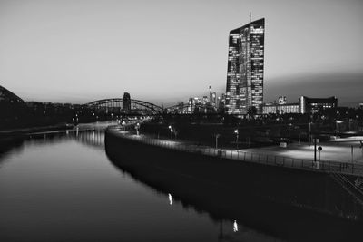 Illuminated city at waterfront