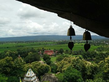 Scenic view of landscape against cloudy sky