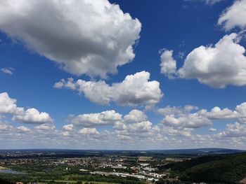 Aerial view of townscape against sky