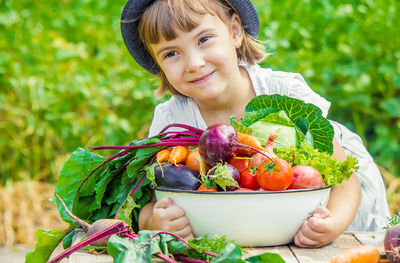 Portrait of cute girl eating food