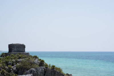 Scenic view of sea against clear sky