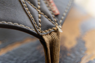 Close-up of rope tied on metal