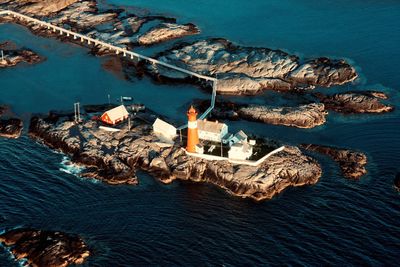 High angle view of sea and buildings