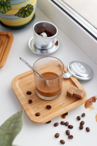 High angle view of coffee cup on table