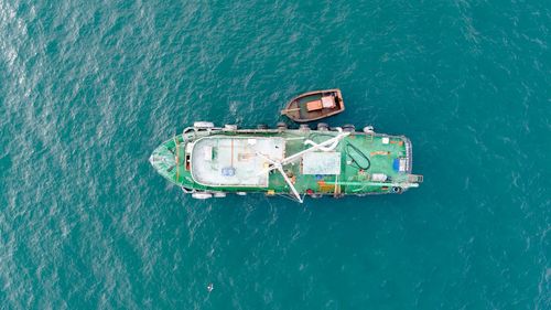 High angle view of ship sailing on sea