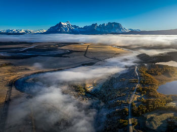 Scenic view of snowcapped mountains against sky