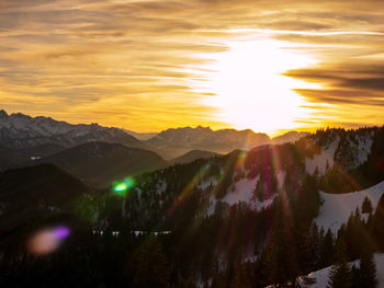 Scenic view of mountains against sky during sunset