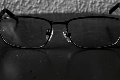 Close-up of sunglasses on table