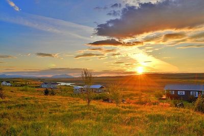 Scenic view of landscape at sunset