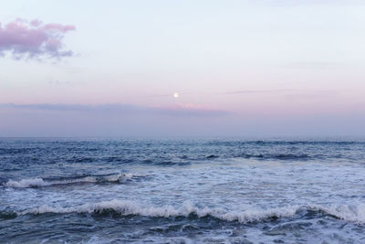 Scenic view of sea at sunset