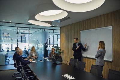 Businessman leading a presentation during a meeting