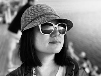 Portrait of young woman wearing sunglasses