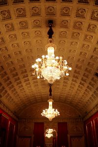 Low angle view of illuminated ceiling