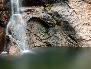 Close-up of water flowing through rocks