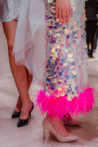 Fashion models on backstage dressed in a long haute couture boudoir dresses outfits and high heels. 