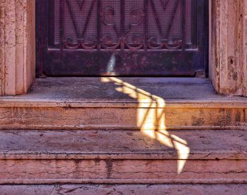 Sunlight falling on closed door